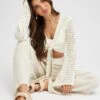 White Crochet Tie Up Cardigan 1 White Crochet Tie Up Cardigan -Women Clothing Shop kn2341 41j cream 1